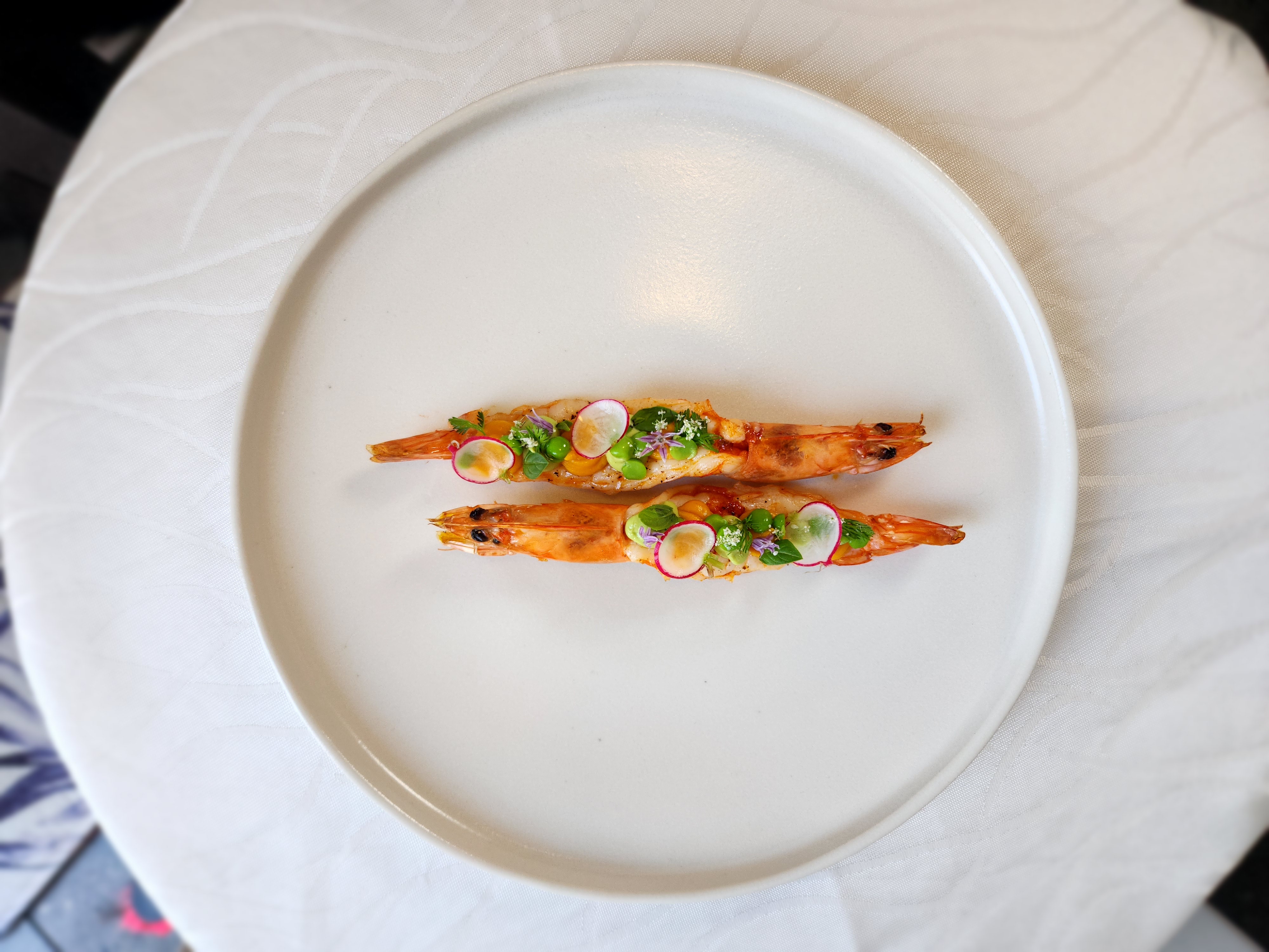 Composed tasting course with edible flowers