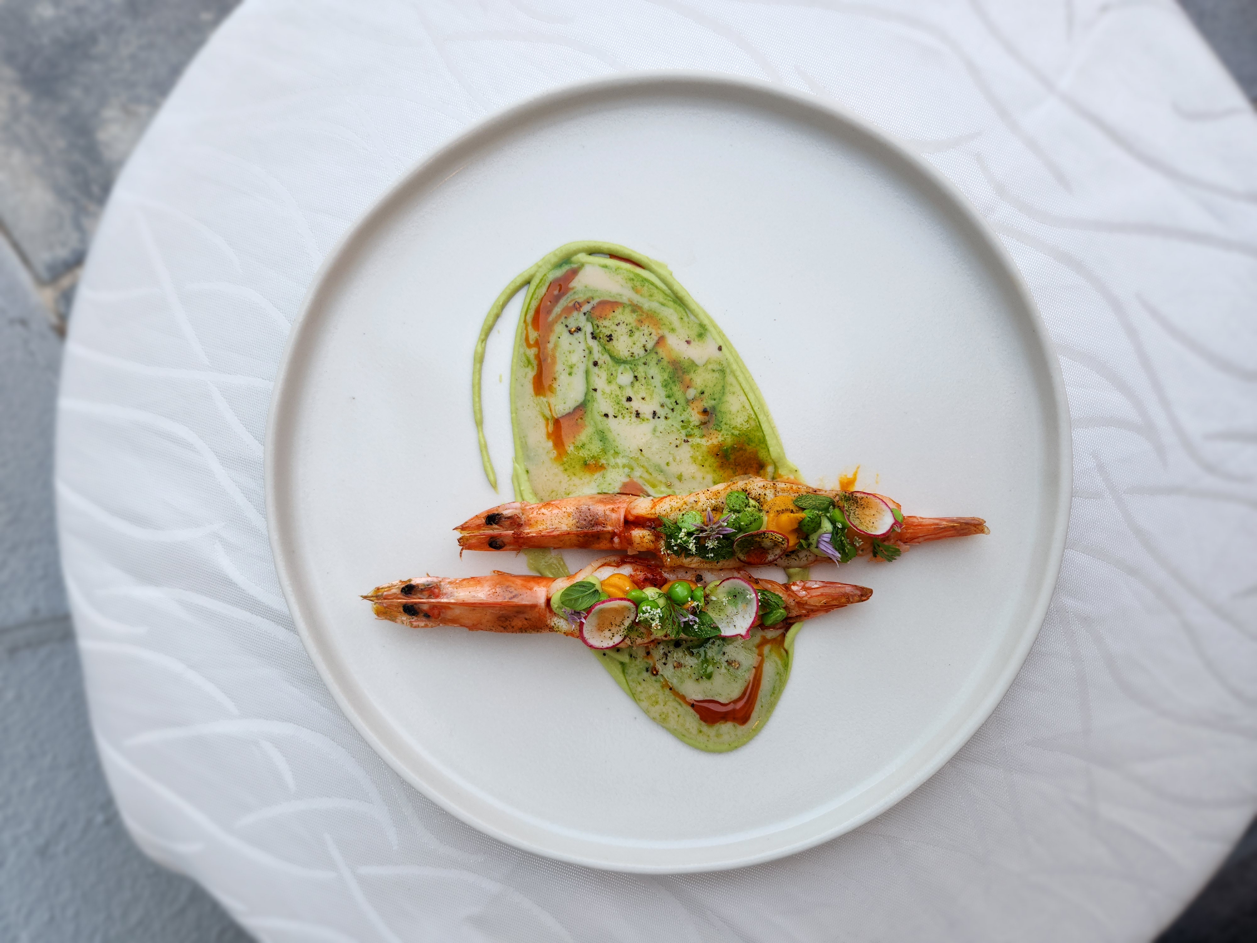 Signature tasting course with layered plating